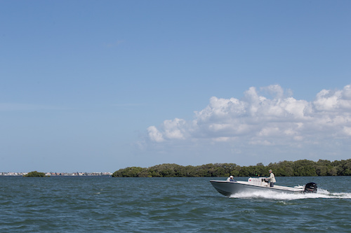 boaters watch the clouds