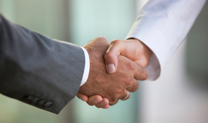 Handshake Two people shaking hands