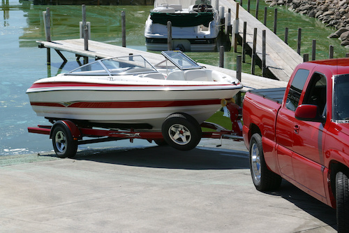 how far to back boat trailer into water