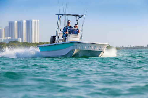 Why do boats in shallow water travel faster?