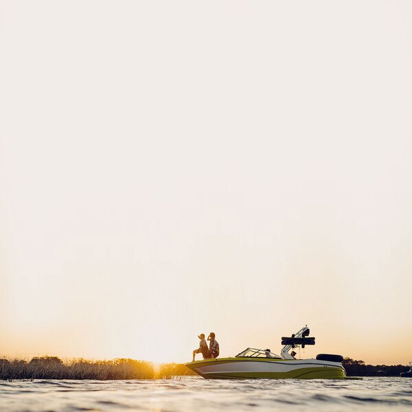 Couple on a boat at sunset
