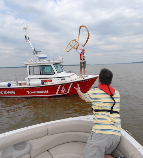 towing a boat in the water