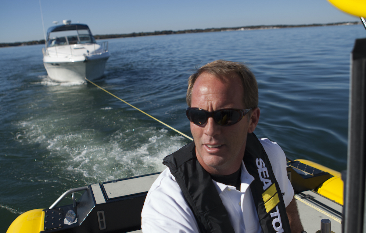 Towing a Disabled Boat in the Water